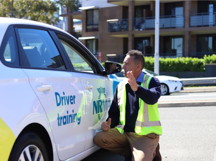 Business driver training man by car