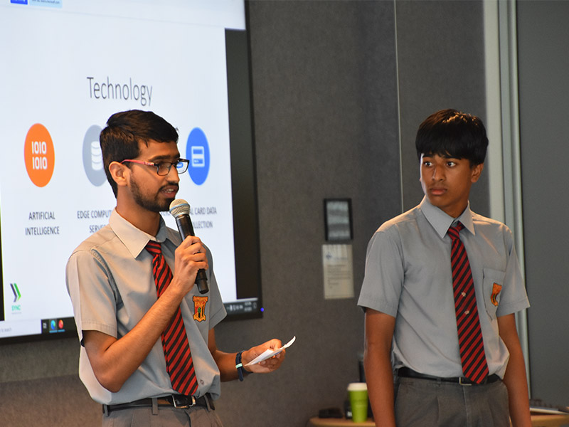 Half of the team from Normanhurst Boys School presenting at the finals.