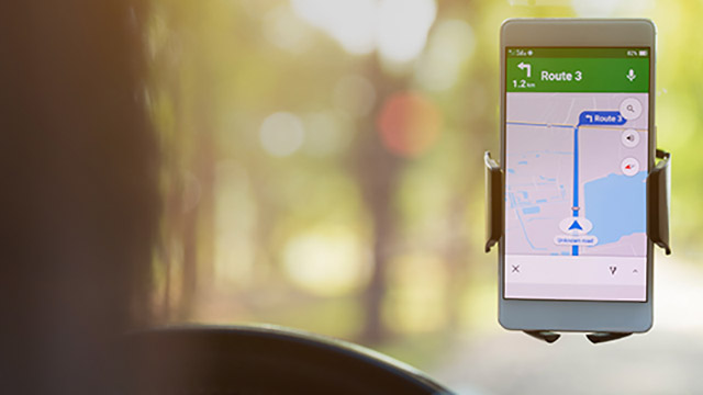 Where should I mount my mobile phone or GPS navigation system?