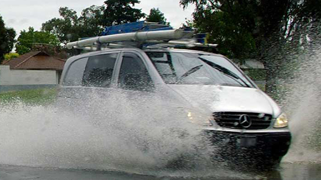 Business vehicle in water