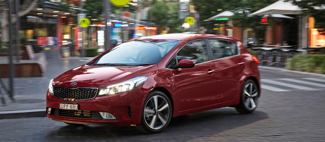 Red exterior 2017 Kia Cerato small car