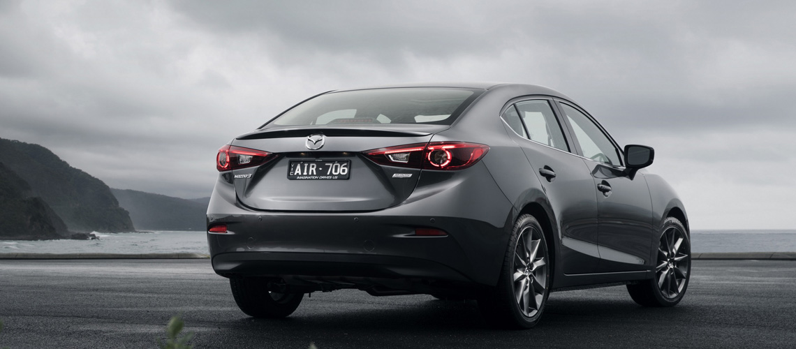 2016-Mazda3-Astina-sedan-grey-rear