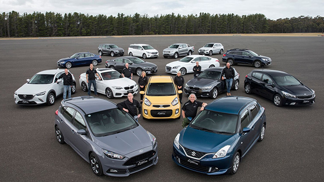 Judges standing with the winning cars at the 2016 Australia's Best Cars awards