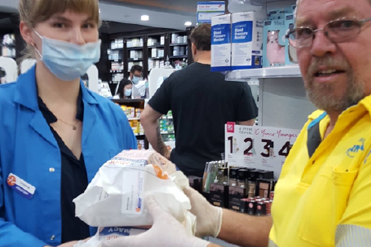 PLH NRMA Patrol Paul Jones picking up medicines from a pharmacy to deliver to the vulnerable elderly