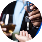 person handing over car keys to a designated driver