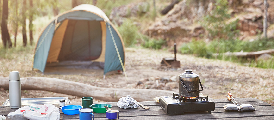 Tent and camping equipment in nature