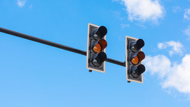 NRMA Can I get fined for driving through amber yellow traffic lights