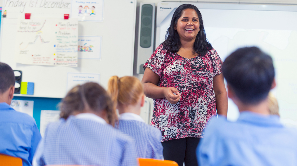 teacher in front of students in class