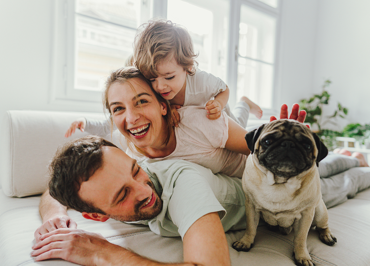 family with pet pug