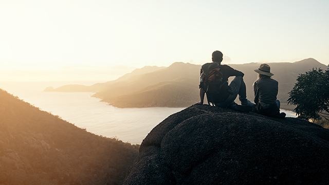 Young couple hiking in the mountains