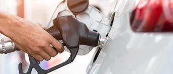 Filling car with fuel and WEX Motorpass fuel card savings