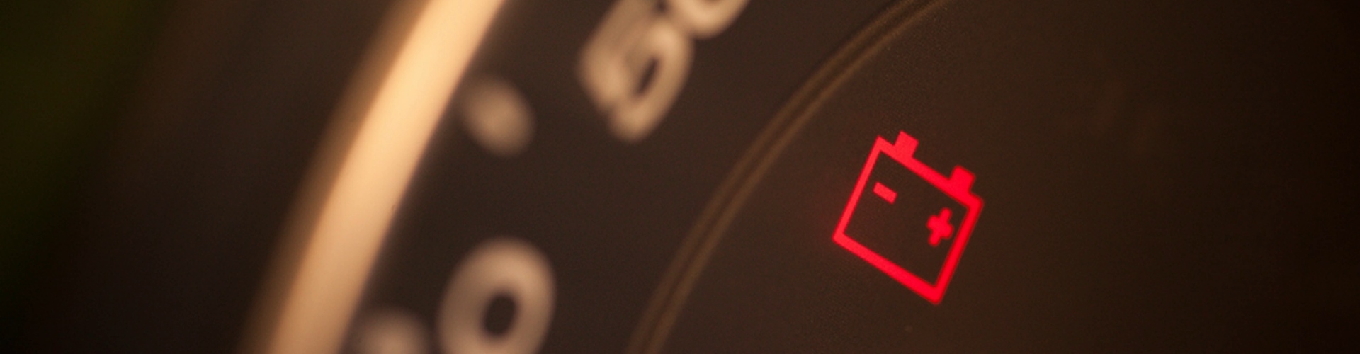 Red battery warning sign display.