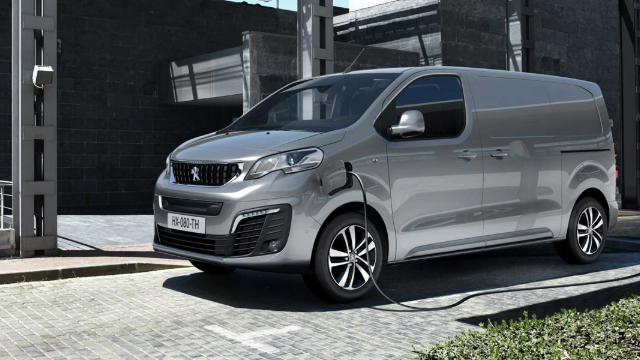 Side-angle view of a grey Peugeot.