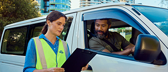 An NRMA Driving Instructor coaching a driver 