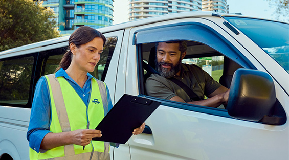 An NRMA Driving Instructor coaching a driver 