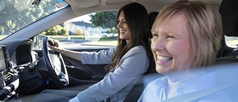 Women in car coaching