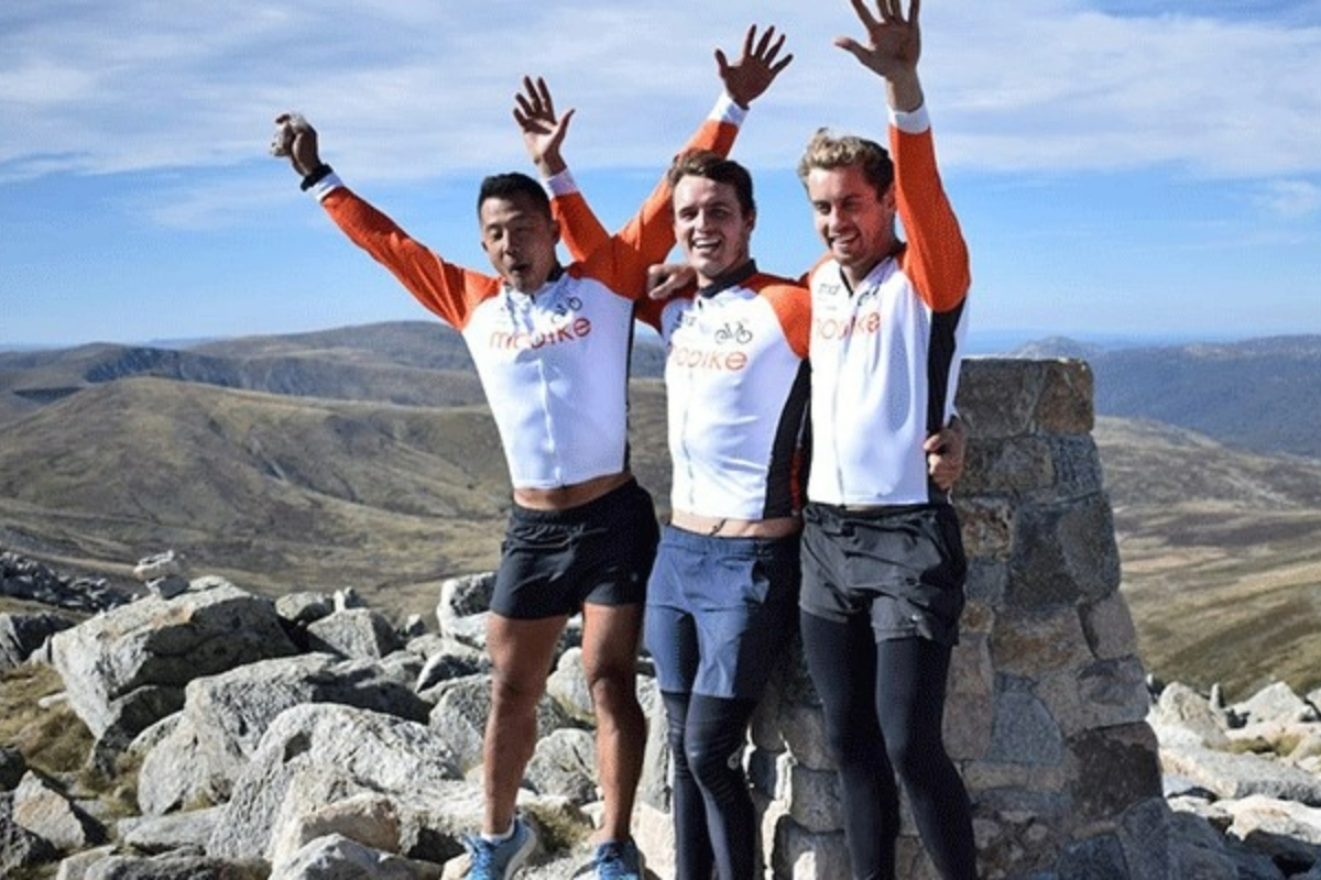three-men-celebrate-at-mountaintop-1200x800 Slide 3