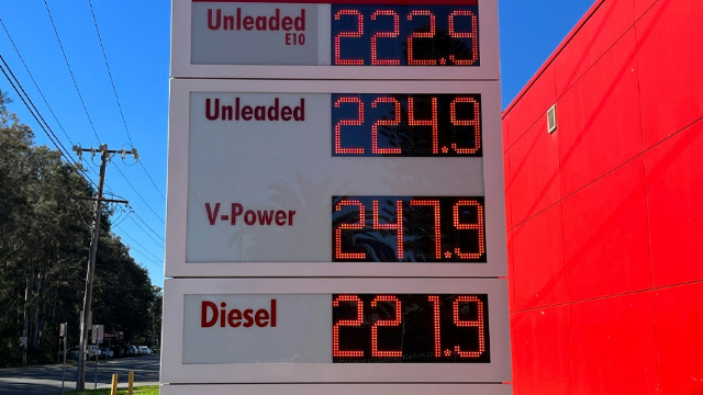 A digital sign showing fuel prices of Unleaded E10 at 222.9, Unleaded at 224.9 and V Power at 247.9.