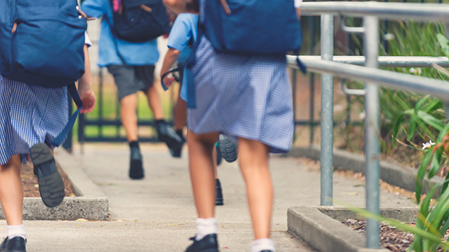 Kids running to school