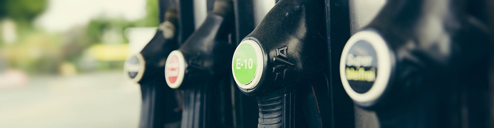 A row of petrol bowsers with e10 in focus