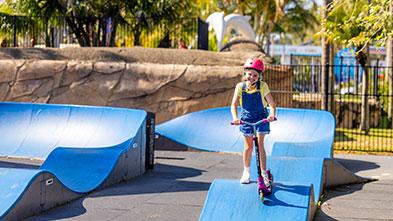 Child riding the pump track at Blue Dolphin