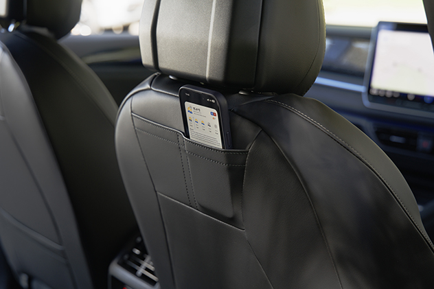 An iPhone in a car seat pocket