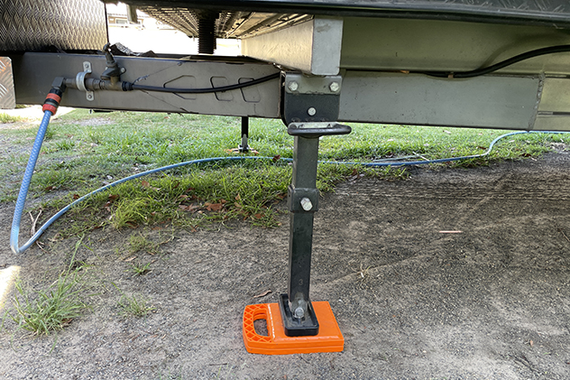 Pad used to level caravan leg