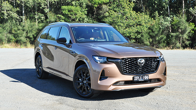 Mazda CX-80 near some trees