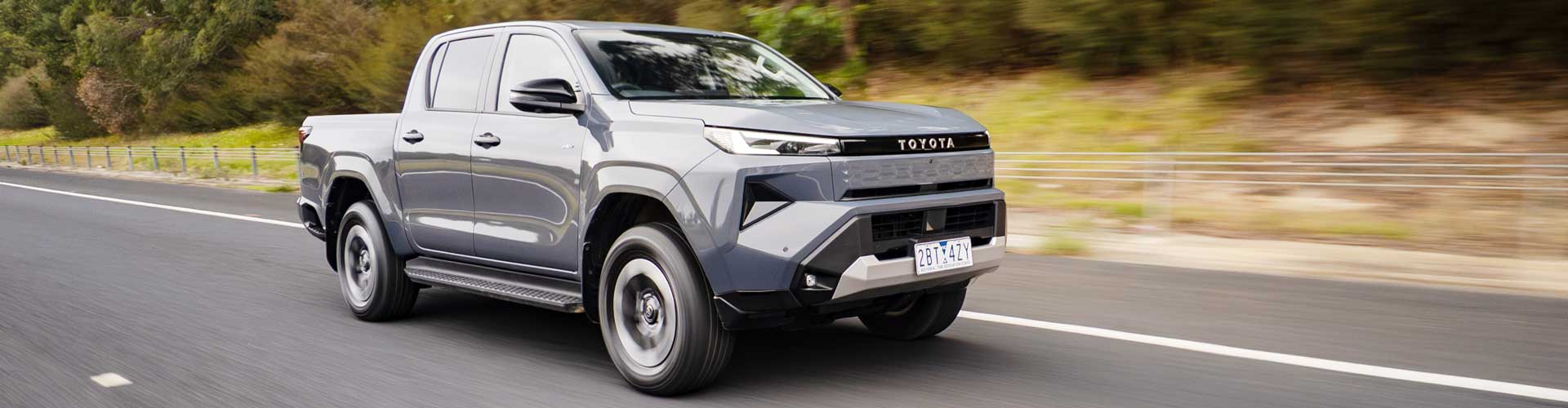 2026 Toyota Hilux BEV SR5 2026 Toyota Hilux BEV driving on a highway