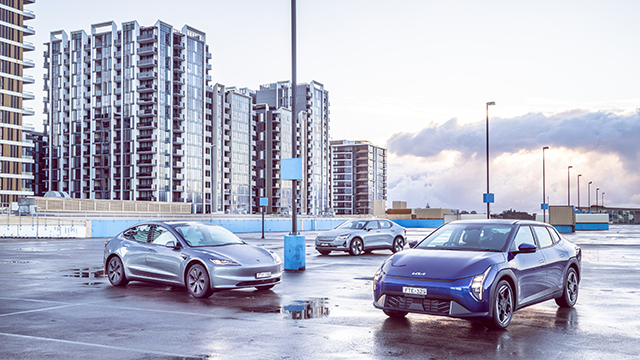 Polestar 2, Kia EV4, and Tesla Model 3 in a carpark