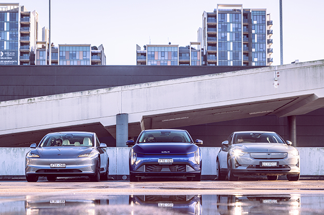 Polestar 2, Kia EV4, and Tesla Model 3 in a carpark