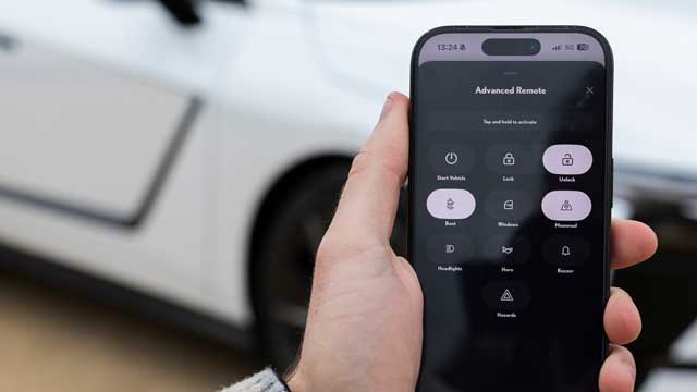 A smartphone in front of a car