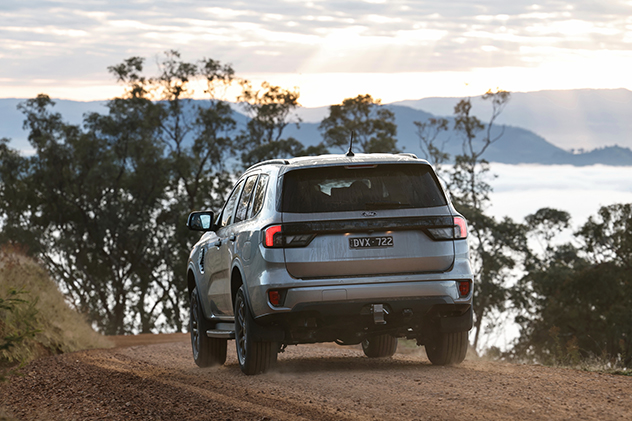 Back of a Ford Everest on a gravel road