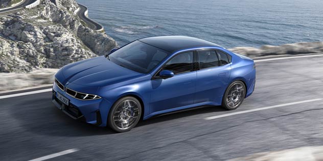 Blue BMW i3 on coastal road