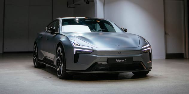 Silver sports car in open air garage
