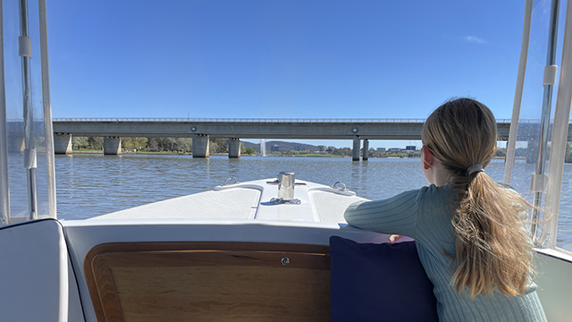 An electric boat on Lake Burley Griffin