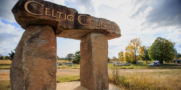 Standing stone sign reading 'Celtic Country' welcoming visitors to Glen Innes.