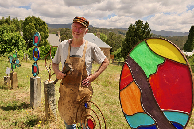 Ron Fitzpatrick with colourful metal work sculptures