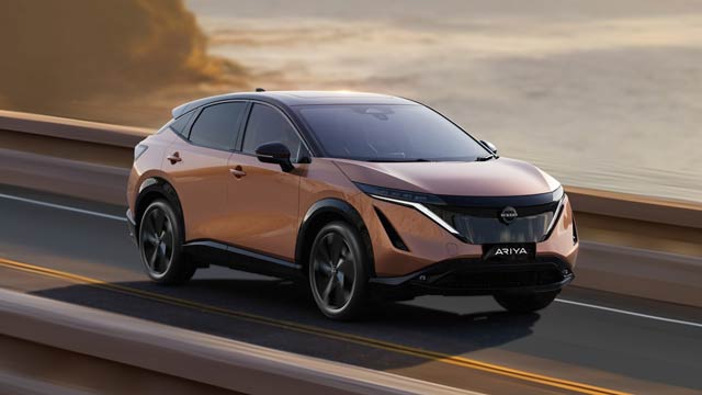 Copper Nissan Ariya driving on Seacliff bridge