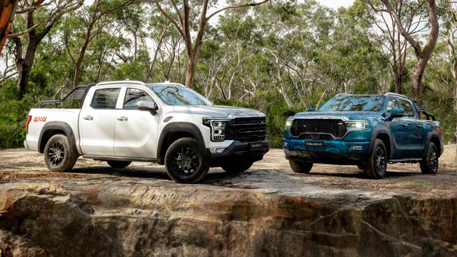 White Foton Tunland V7 and blue V9 parked in bushland