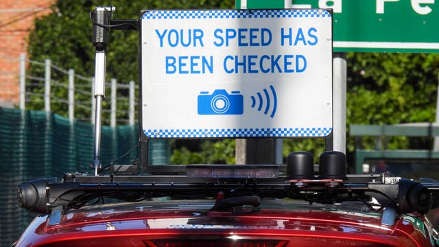 Blue and white "Your speed has been checked" sign in NSW