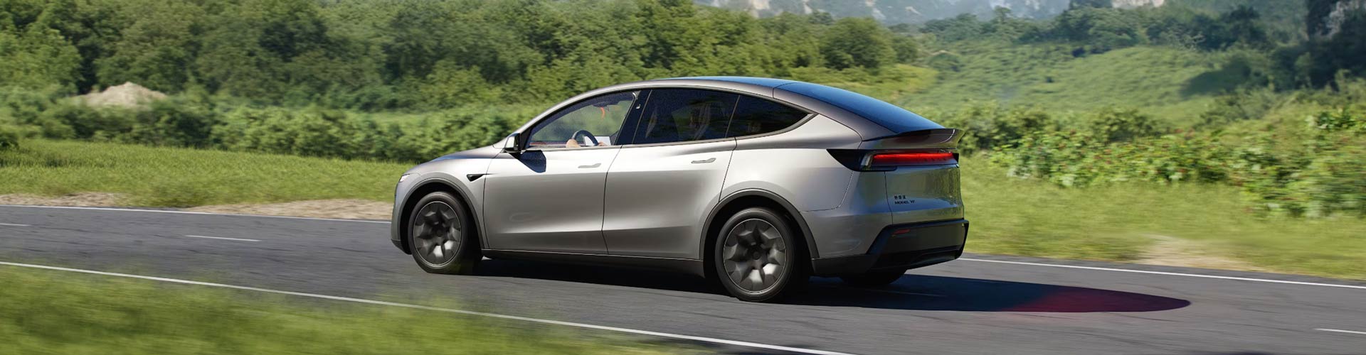 Silver LHD Model Y L front row