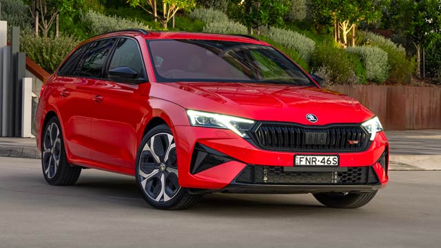 Wide angle shot of a red Skoda Octavia RS wagon