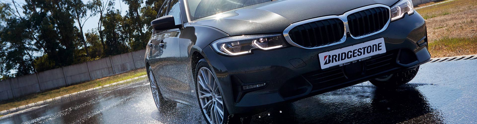 Car testing Bridgestone Turanza 6 tyres on a wet surface