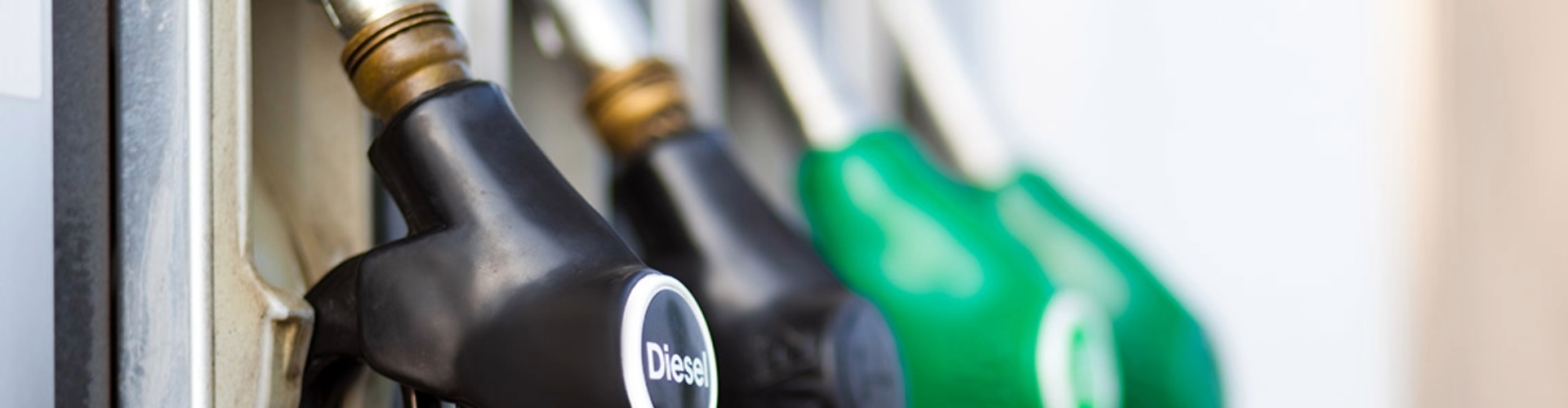 Generic petrol bowser with 4 fuel pumps close up of petrol bowser with four fuel pumps