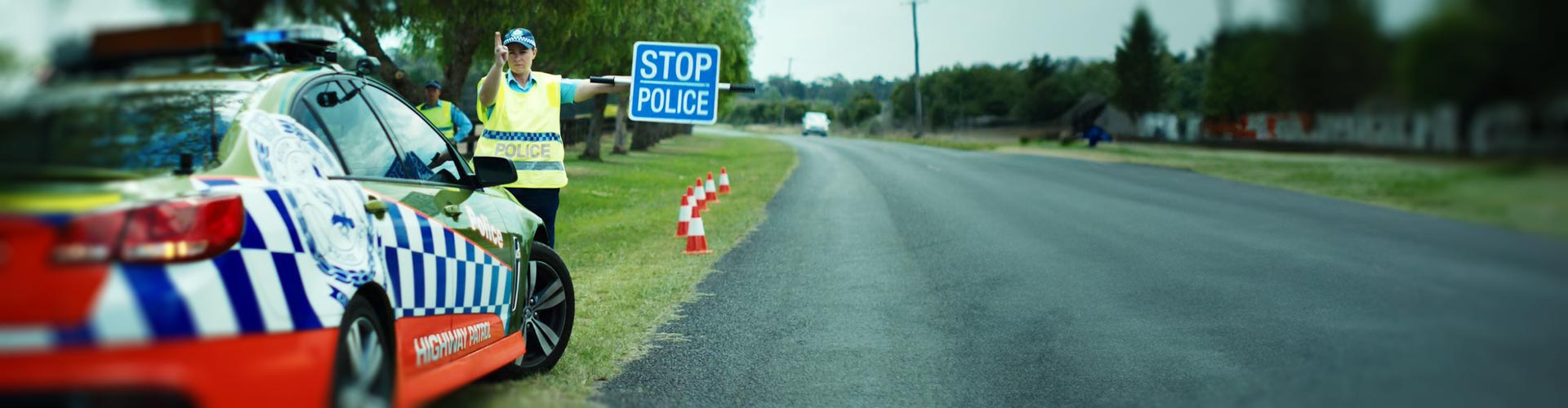Policeman waves a driver into an RBT radostop