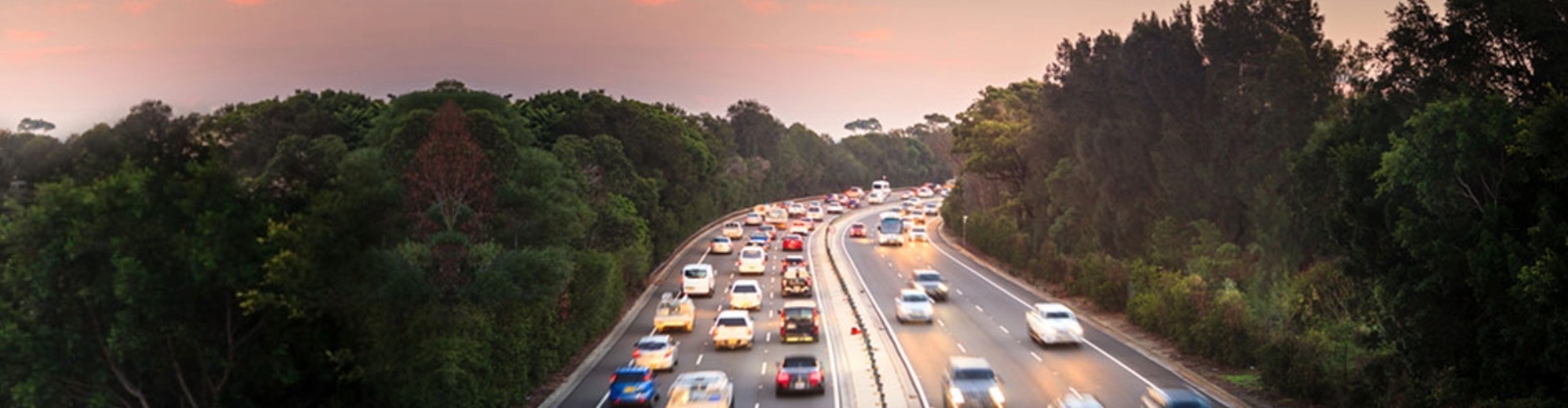 Traffic on a freeway at dusk