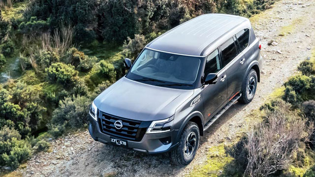 2023 Nissan Patrol Warrior driving on dirt track