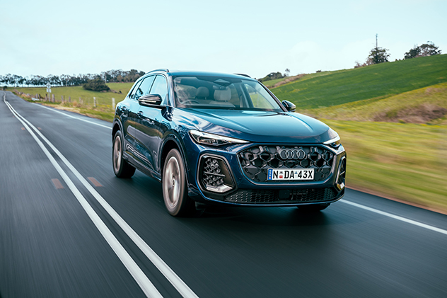 2025 Audi Q5 TDI driving on the road