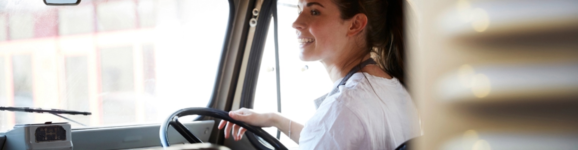 A driver in their work van
